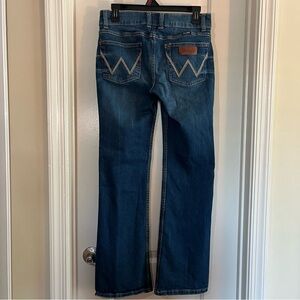 Wranglers jeans mid rise boot cut size 3 x 32. Washed never worn